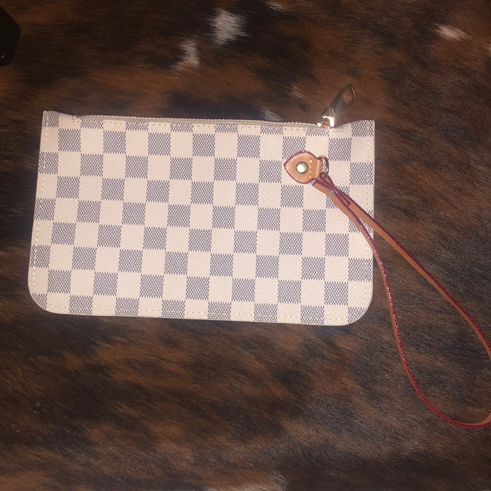 White and gray checkered wristlet
